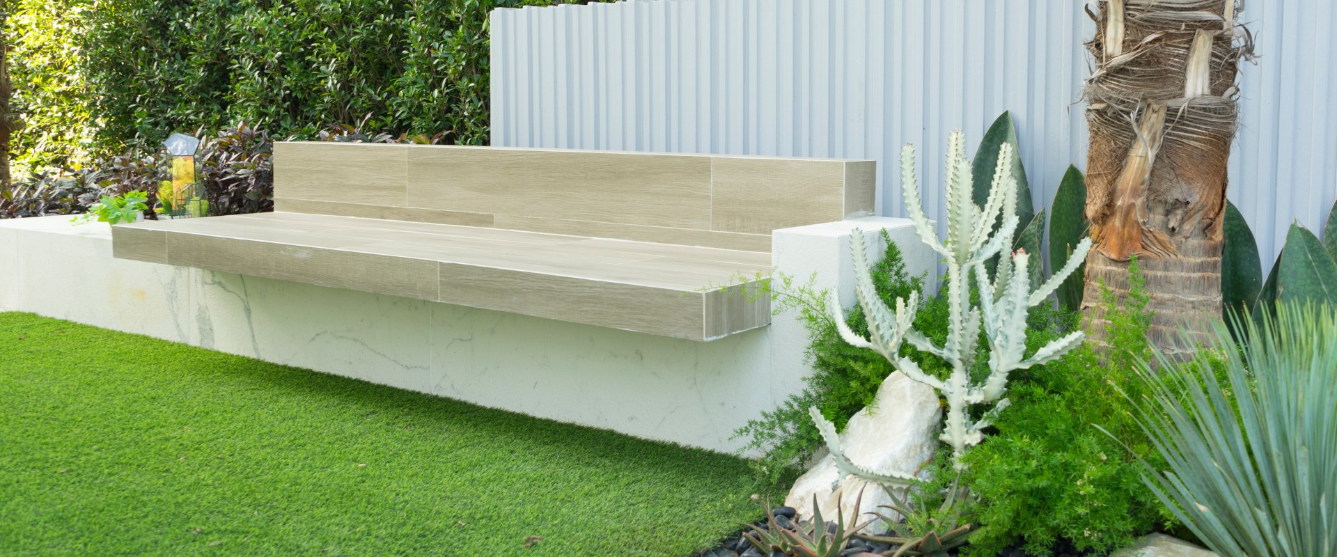 What Types of Fences and Walls Should I Consider for My Residential Landscaping Project?