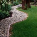 Residential Landscaping Tips for Maintaining Clear Outdoor Drain Paths